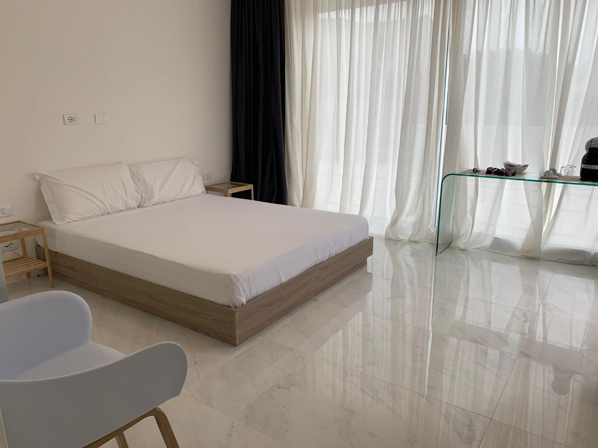 Smart Luxury Suites & Apartments Orosei Pokoj fotografie
